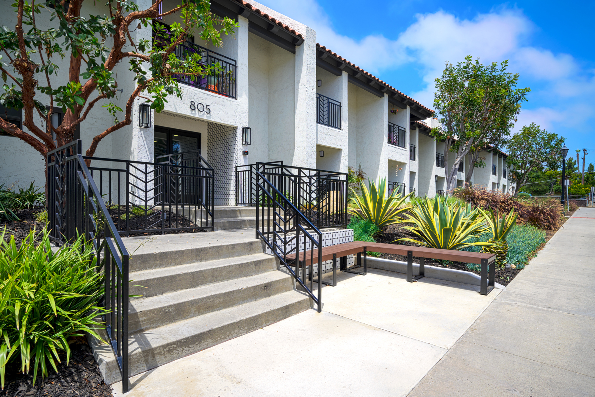 This banner image shows the entrance of Silverado Apartments