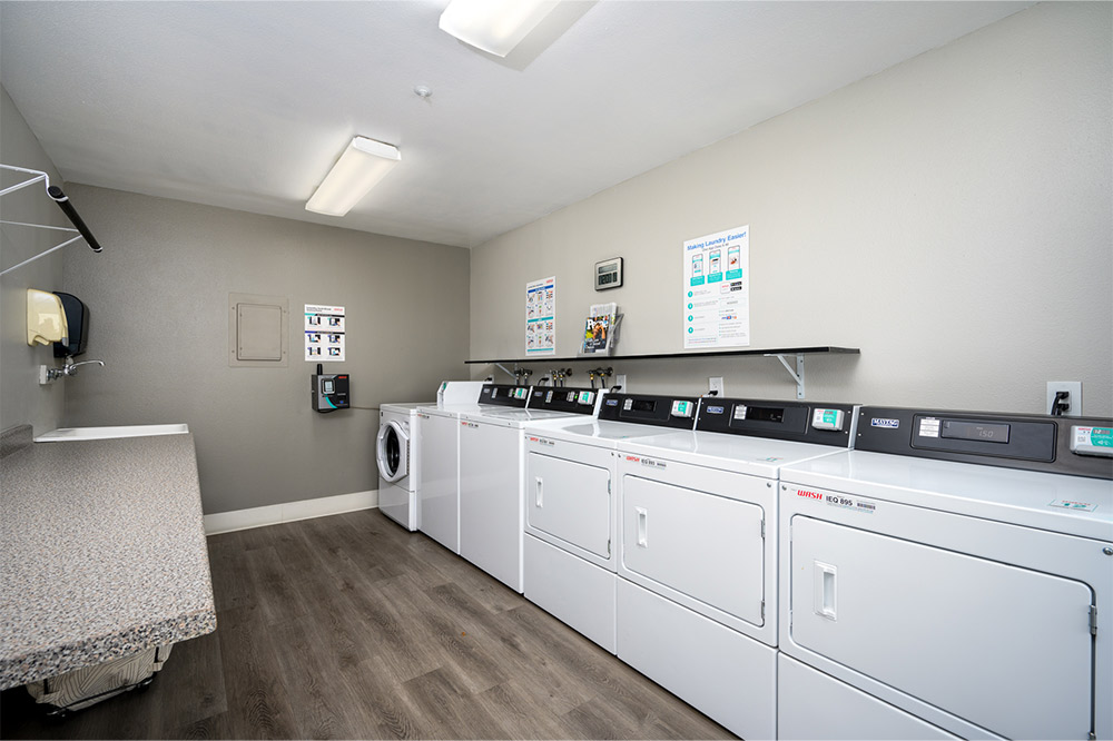 This image displays laundry center photo of Silverado Apartments